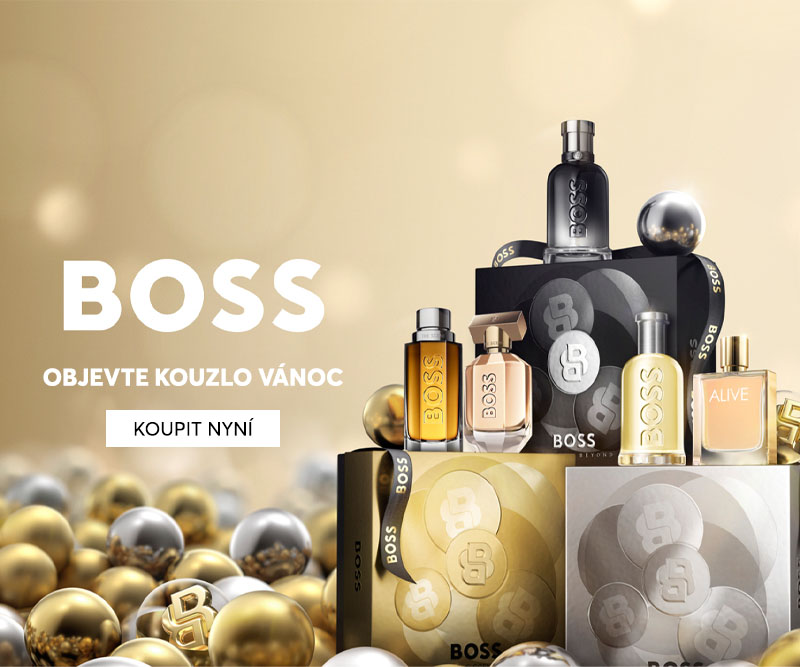 Hugo Boss vánoční dárkové sady parfémů v elegantním zlatém a stříbrném balení obklopené vánočními ozdobami