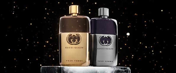 Parfémy Gucci Guilty Pour Femme a Pour Homme – luxusní vůně ve zlatém a stříbrném flakonu, ideální jako dárek.