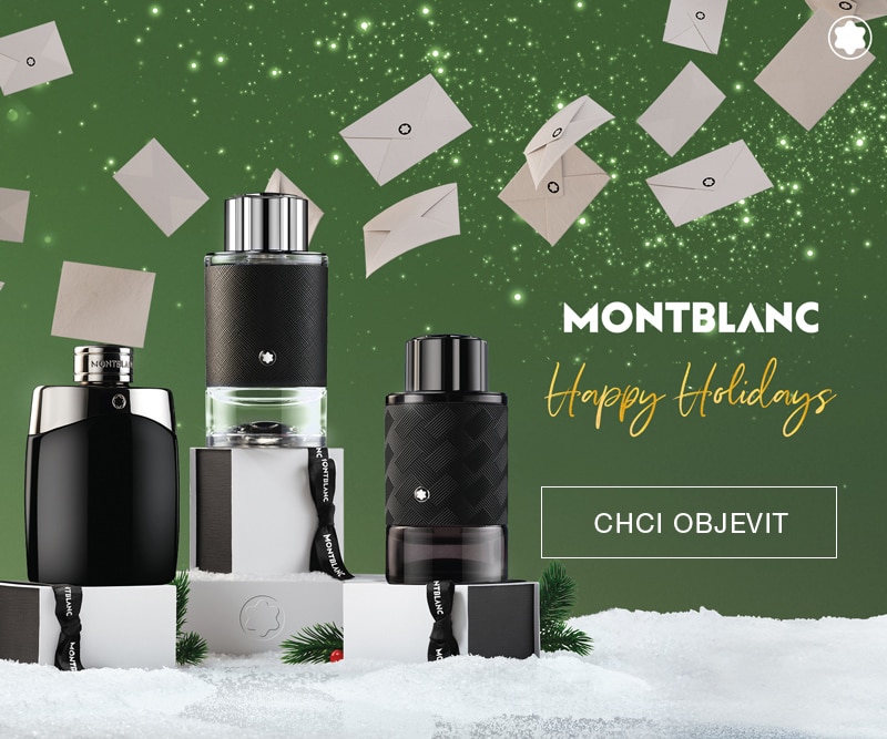 Montblanc pánské parfémy Legend, Explorer a Extreme na dárkových krabičkách, zelené vánoční pozadí s dopisy a textem Happy Holidays – objevte luxusní vůně.