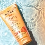 150 ML Nuxe SUN Tající opalovací mléko na tělo s vysokou ochranou SPF 30  2 of 3 Tající opalovací mléko na tělo s vysokou ochranou SPF 30