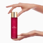 150 ML Carolina Herrera LA BOMBA Rozjasňující tělový olej 2 of 4 Rozjasňující tělový olej